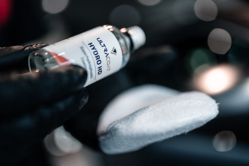 Close-up of ceramic coated car paint showing hardness and gloss