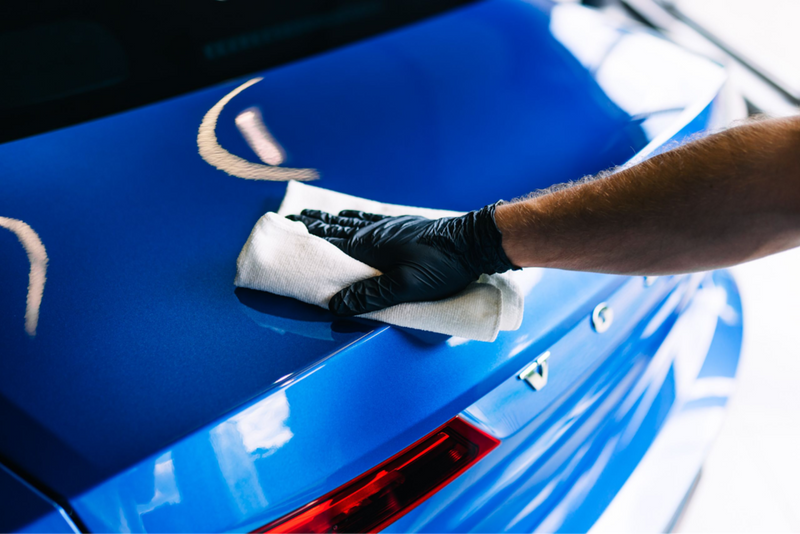 Removing a ceramic coating from car paint by machine polishing