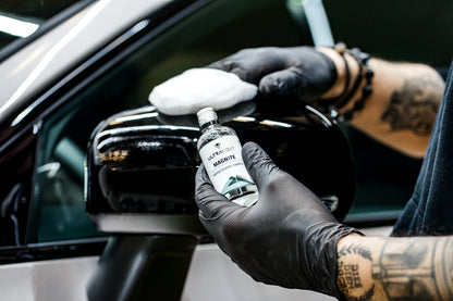 Ultracoat Magnite ceramic coating being applied to a gloss black wing mirror