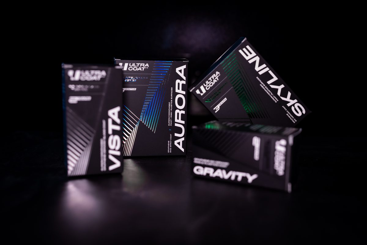Vista, Aurora, Skyline and Gravity ceramic coatings arranged on a dark surface — the Ultracoat ceramic range