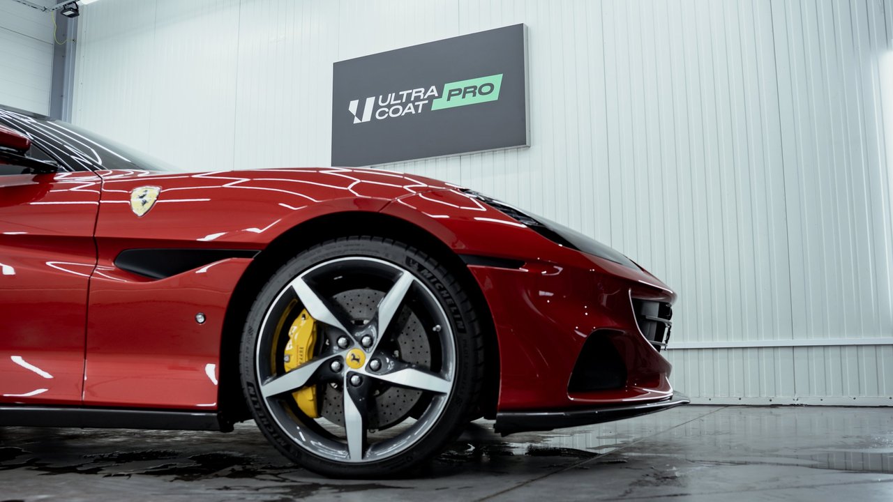 Ferrari front quarter in an ULTRACOAT PRO studio — editorial sign-off